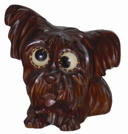 German, Oswald, carved composition case, a floppy eared dog, ca 1948. This one is only 5" tall, complete, and overall in excellent condition. — Antique Clocks Price Guide