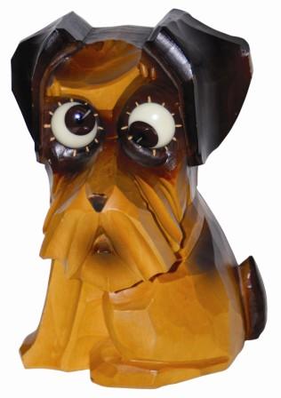 German, Oswald, carved dog, two tone wood case, ca 1948. It is almost 6" tall, complete, all original, excellent condition. — Antique Clocks Price Guide