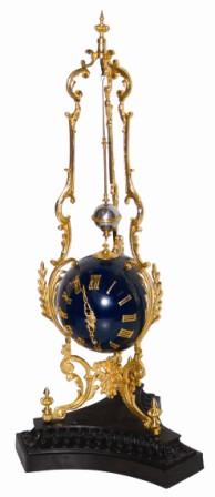 French style conical clock that was copied from an original French conical made in the 1800's. This case is 14" high, made of brass and has all the same pieces and parts as an original that would sell for $2000 or more. — Antique Clocks Price Guide