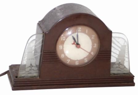 Lackner Neon Glo Clock, Cincinnati, Ohio, "Nassua" model. Metal plaque on the back and a paper underneath, indicate the maker and the model. — Antique Clocks Price Guide