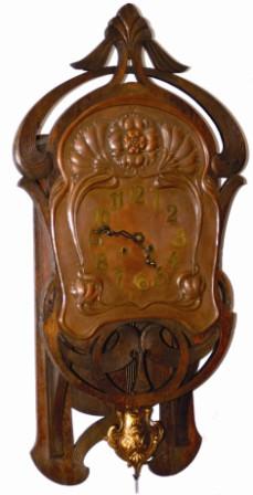 German Art Nouveau wall clock, ca 1920's. This is a heavy oak cased clock and it stands 32" high. — Antique Clocks Price Guide