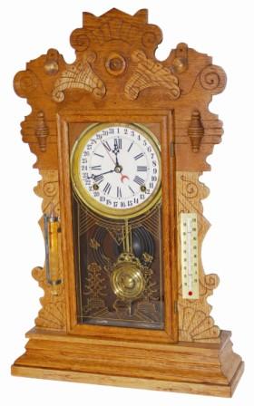 Waterbury Clock Co. oak calendar clock, shelf model, "Gibson", c 1912. — Antique Clocks Price Guide