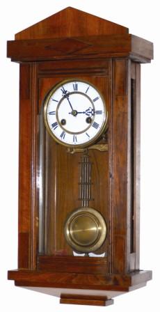 German box clock. The walnut case is only 24" tall, clean, polished, complete, and in excellent original condition. — Antique Clocks Price Guide