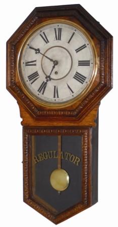 Waterbury Clock Co. hanging clock, "Heron 12 Inch", ca 1906. — Antique Clocks Price Guide