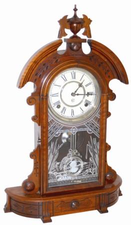 Waterbury Clock Company walnut parlor clock, "Hecla", ca 1881. At first glance you think the case is missing some finials, it isn't. — Antique Clocks Price Guide