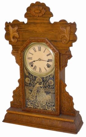 E. Ingraham Clock Co. oak kitchen clock, much cleaner than the previous, you can at least tell it is oak. — Antique Clocks Price Guide