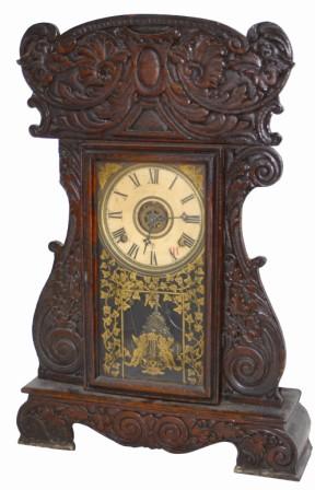 Wm. L. Gilbert Clock Co. oak kitchen clock, ca 1913. — Antique Clocks Price Guide