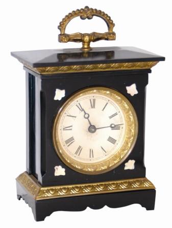 Fancy alarm clock. I am not sure if it is American or French made, not signed anywhere visible. — Antique Clocks Price Guide