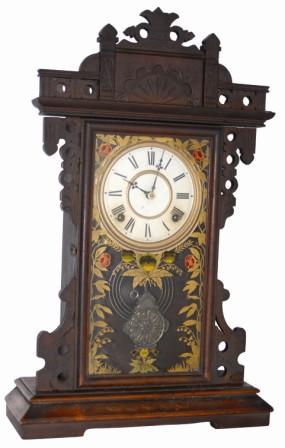 E. N. Welch walnut parlor clock. There are two labels on the back, deteriorated but you can see the Welch name clearly. — Antique Clocks Price Guide