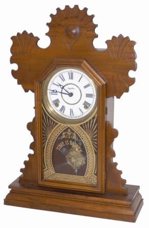 E. Ingraham Clock Co. walnut parlor clock, "Tulip", ca 1895. — Antique Clocks Price Guide