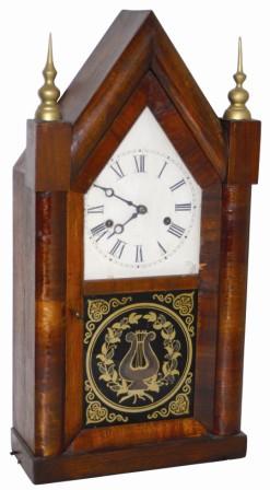 Steeple case, 20" high, mahogany veneered, it is old, possibly late 1800's. — Antique Clocks Price Guide