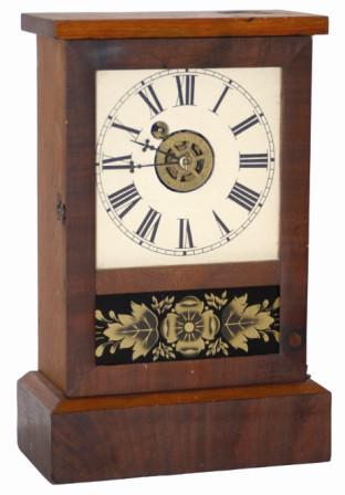 Waterbury Clock Company mantle clock, "Cottage", ca 1861. Case is only 11" high, appears to have some mahogany and some pine woods. — Antique Clocks Price Guide