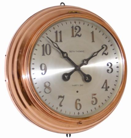 Seth Thomas Clock Co., unusual polished brass step back designed gallery clock with a 30 day movement. — Antique Clocks Price Guide