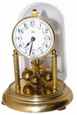 Miniature Anniversary clock. Porcelain dial is signed, "Kern / Made In Germany", and the movement is signed, "KS / Germany / Kern u Sohne". — Antique Clocks Price Guide