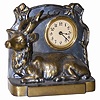 American novelty featuring an elk. Cast metal case is 6" high, has the excellent original finish.