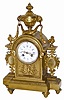 French brass shelf clock, overall in very good original condition. It is 15" tall, has several cast objects and moldings cast into the feet and case body.