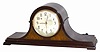 Telechron Motored / Westminster Chime, painted on the dial of this tambour clock. Complete label on the metal back cover that says in part, "Revere Chime / Telechron Motored / The Revere Clock Co. Cincinnati, Ohio".
