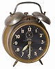 German alarm clock, "Bradley". Metal case is 6.5" high, tarnished, good glass, dial, and hands.