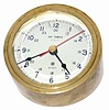 Metal desk clock, quartz movement is running.