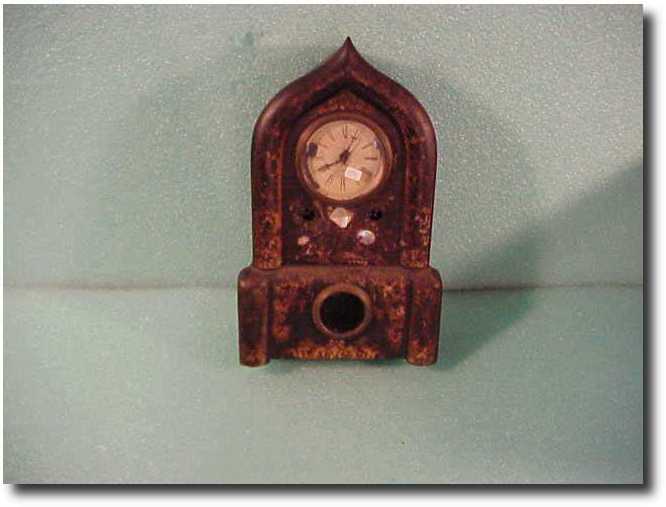 Gothic iron front clock — Antique Clocks Price Guide