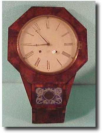 E.N. Welch octagon drop dial wall clock — Antique Clocks Price Guide