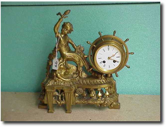 French figural mantle clock — Antique Clocks Price Guide
