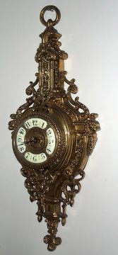 A FRENCH BRASS CARTEL WALL CLOCK — Antique Clocks Price Guide