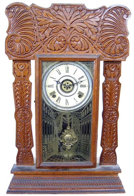 Ingraham "Arctic" pressed oak kitchen clock. — Antique Clocks Price Guide