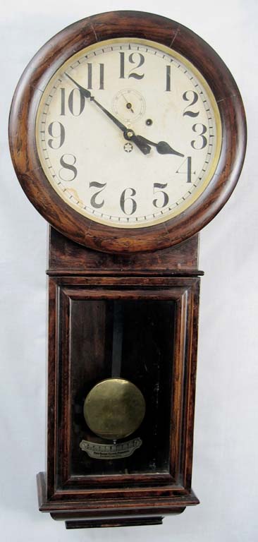 New Haven "Saturn" regulator. — Antique Clocks Price Guide