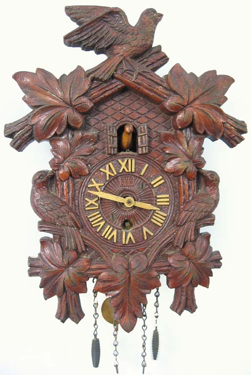 Lux Bobbing Bird Clock. — Antique Clocks Price Guide