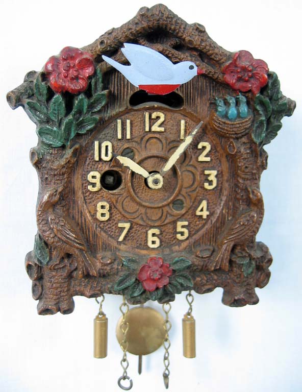 Lux Bluebird Bobbing Clock. — Antique Clocks Price Guide