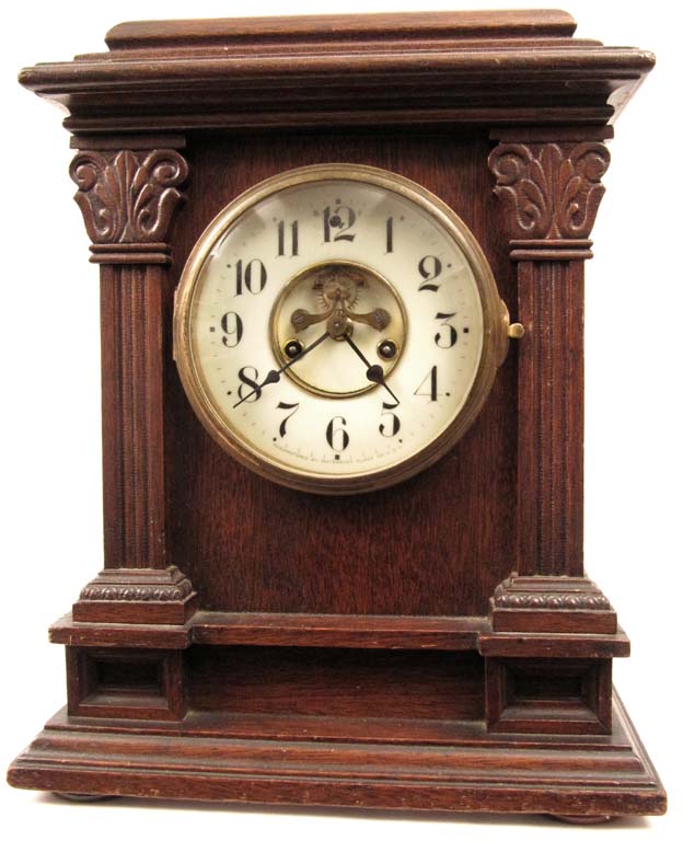 Waterbury "Suffolk" oak cabinet clock — Antique Clocks Price Guide