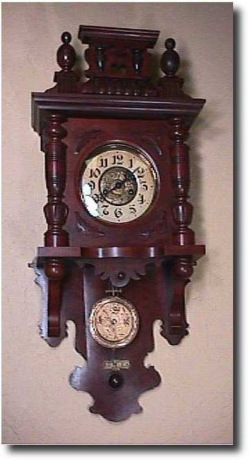 Open Well Free Swinger Wall Clock, Circa 1930 — Antique Clocks Price Guide