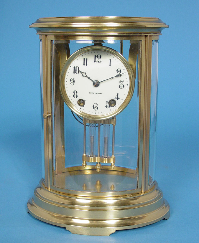 American Seth Thomas Clock Co. "Orchid" Oval Cased Crystal Regulator Clock, — Antique Clocks Price Guide
