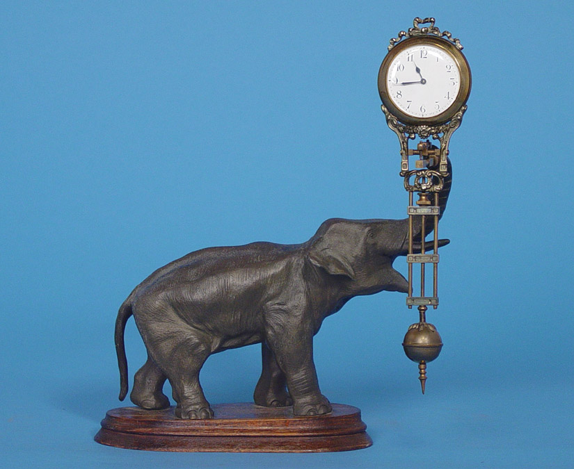 German Junghans Mystery Elephant Swing Arm Clock, — Antique Clocks Price Guide