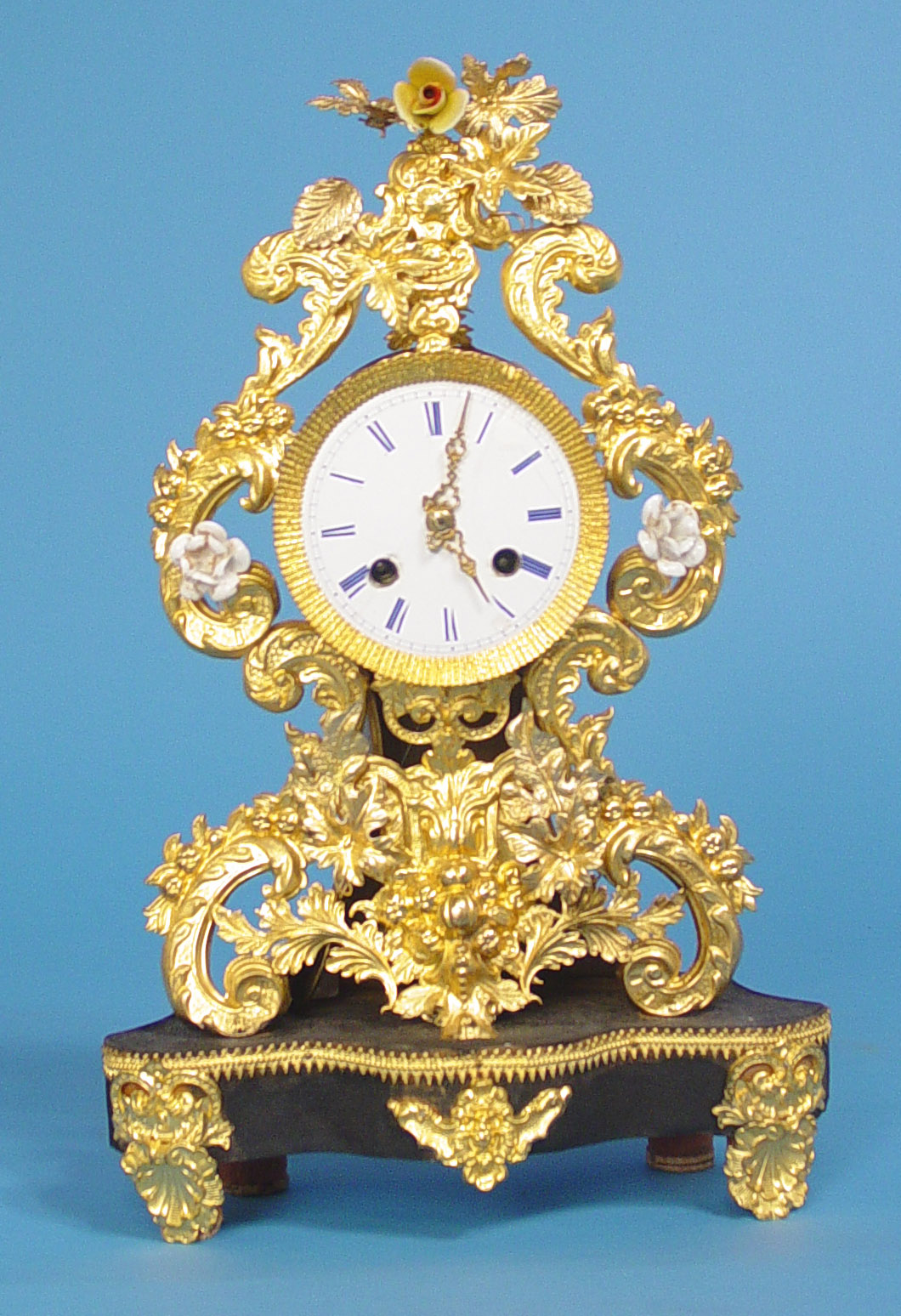 French Small Gilt Brass Repousse Table clock, — Antique Clocks Price Guide