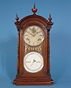 American Fashion Calendar Clock Co. and Seth Thomas "Calendar No. 5" Walnut Double Dial Calendar Shelf Clock,