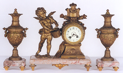 A FRENCH THREE PIECE GILT BRONZE CLOCK SET: — Antique Clocks Price Guide