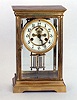 A WATERBURY BRASS CASED MANTEL CLOCK