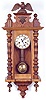 WALNUT SHORT CASE WALL CLOCK, Gustav Becker Clock Co.,