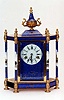 A CHINESE ENAMELED BRASS MANTLE CLOCK,