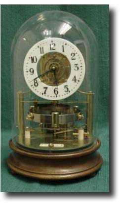 Reason electric clock, c. 1910 — Antique Clocks Price Guide