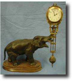 Elephant swinging arm Mystery clock by Junghans, c1900 — Antique Clocks Price Guide