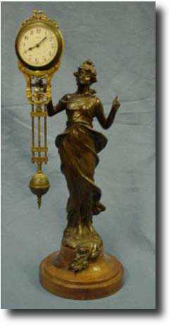 Diana swinging arm mystery clockby Junghans, c1900 — Antique Clocks Price Guide