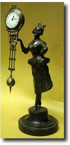 Swinging mystery clock by Junghans c. 1900 — Antique Clocks Price Guide
