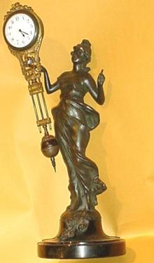 Mystery clock in "Diana" pattern — Antique Clocks Price Guide