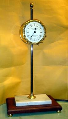 Gravity clock 8 day duration — Antique Clocks Price Guide