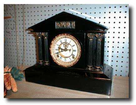 Ansonia "Capri" Model Black Enameled Iron Mantel Clock, circa 1905 — Antique Clocks Price Guide