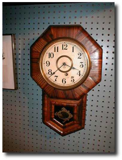 American "schoolhouse" clock c. 1901 — Antique Clocks Price Guide