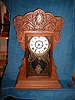 Oak "Gingerbread" mantel clock-8 day with strike on the hours and half/hour.